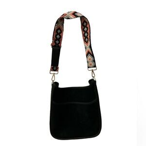 Ahdorned velvet material bag.